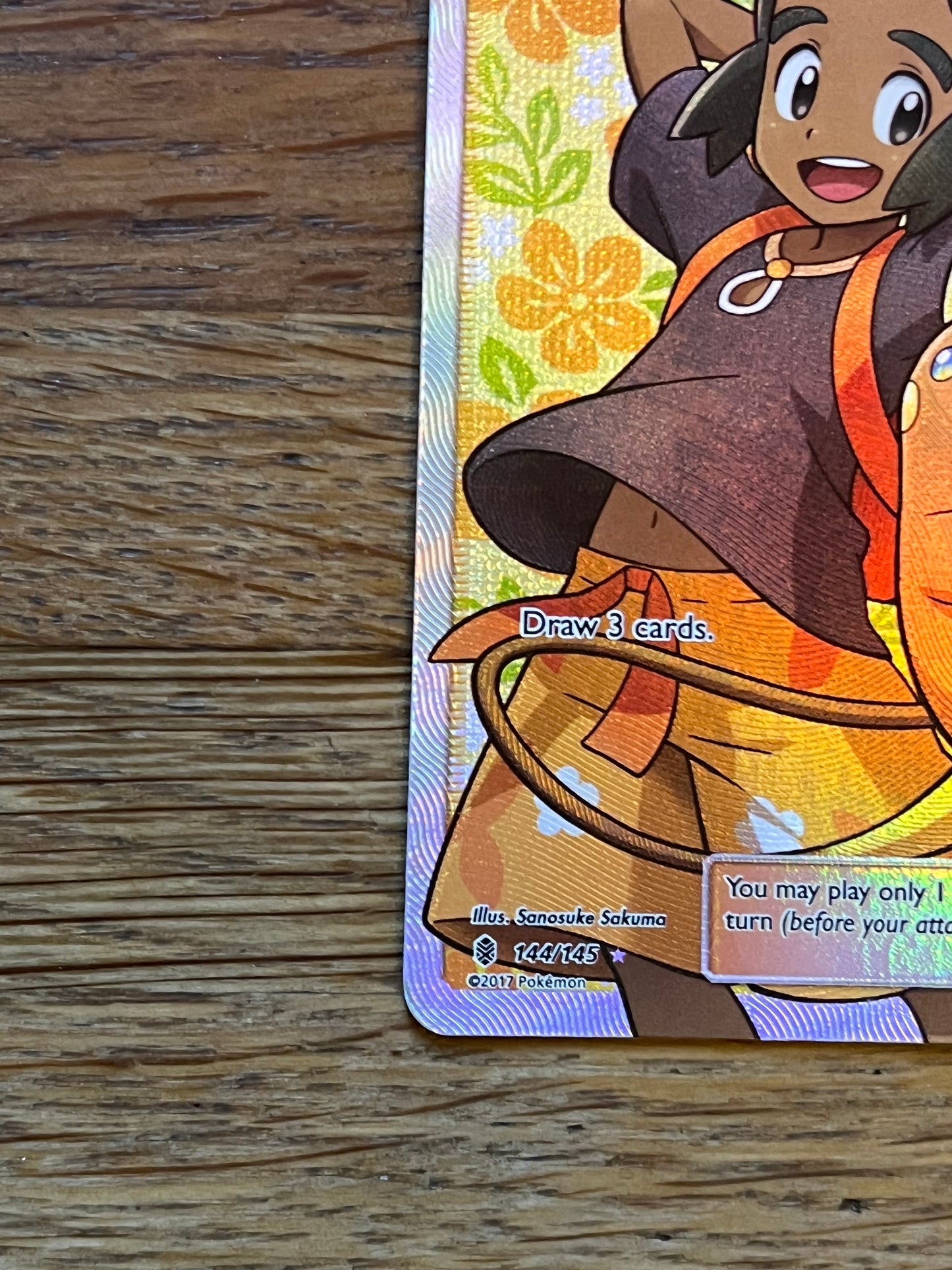 Hau 144/145 Guardians Rising NM Single Pokémon Card