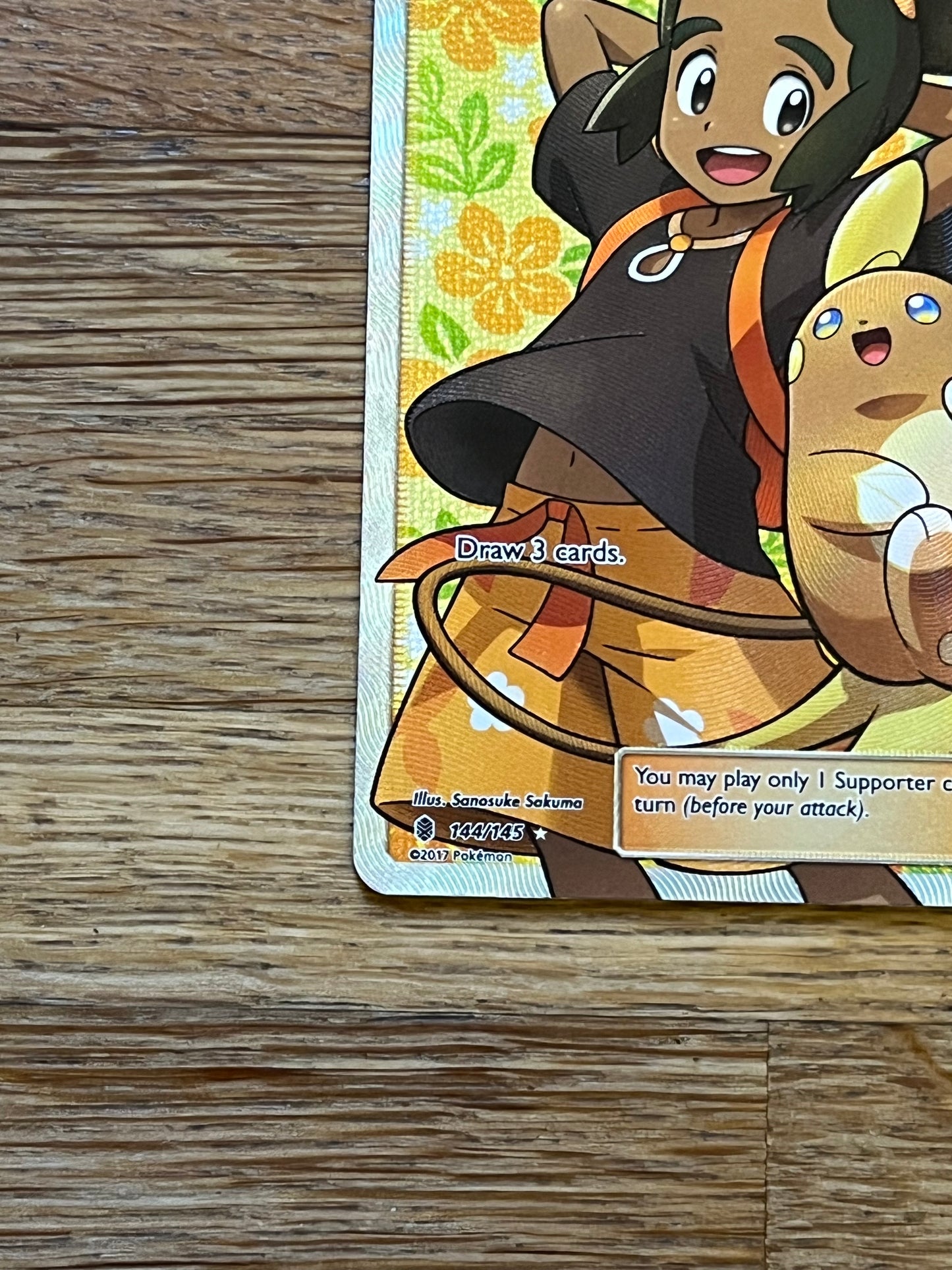 Hau 144/145 Guardians Rising NM Single Pokemon Card