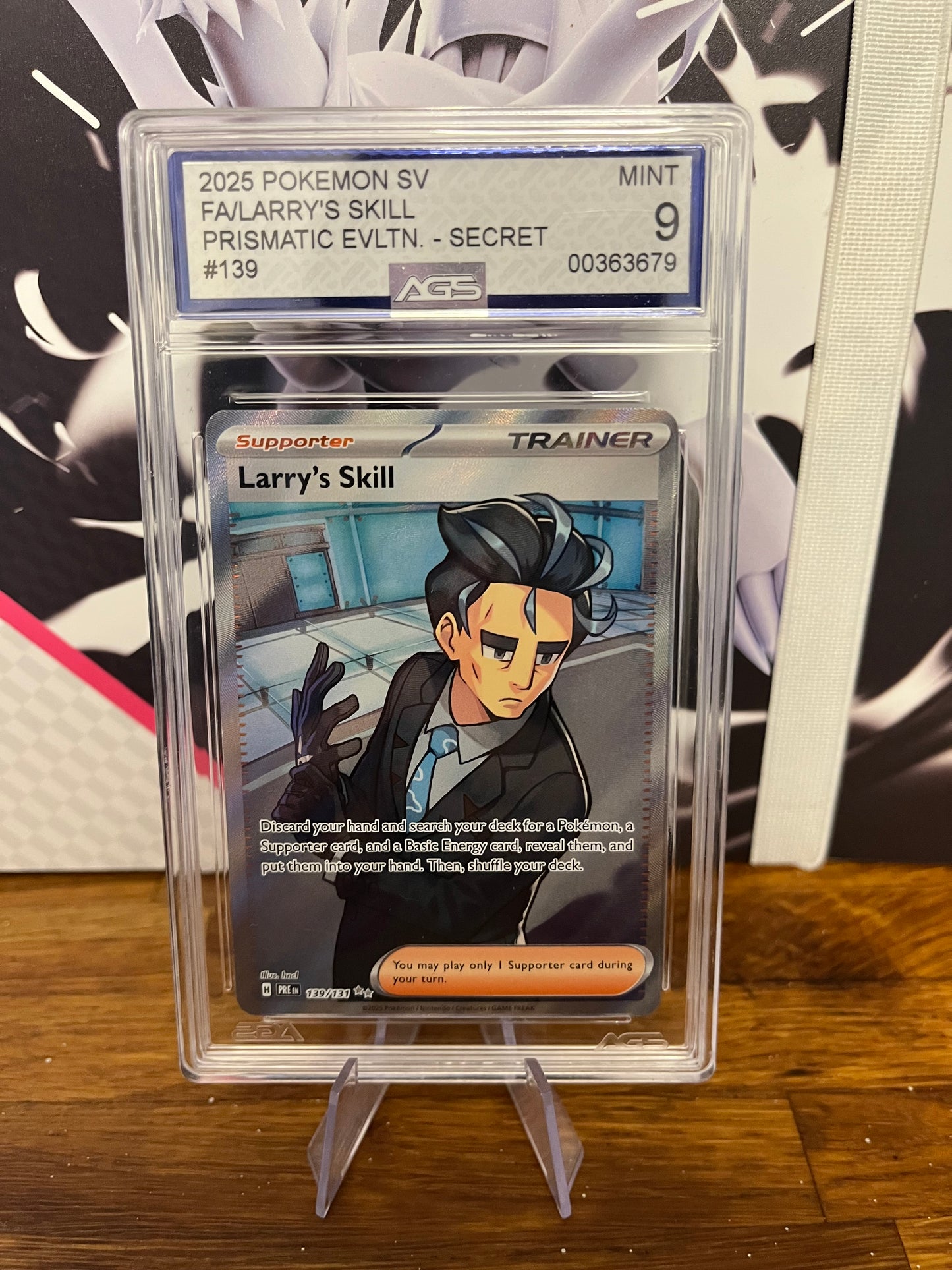 Larry's Skill 139/131 Special Illustration Rare Prismatic Evolutions AGS 9 Graded Pokémon Card